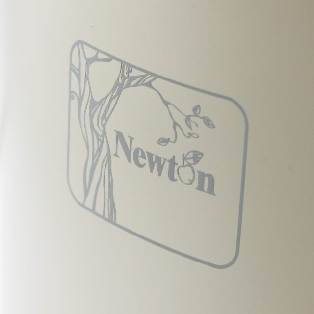 Close-up of Newton logo on a water filter system.