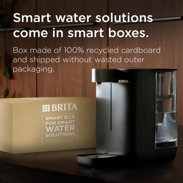 BRITA Cube Black hot water dispenser next to its recycled packaging box