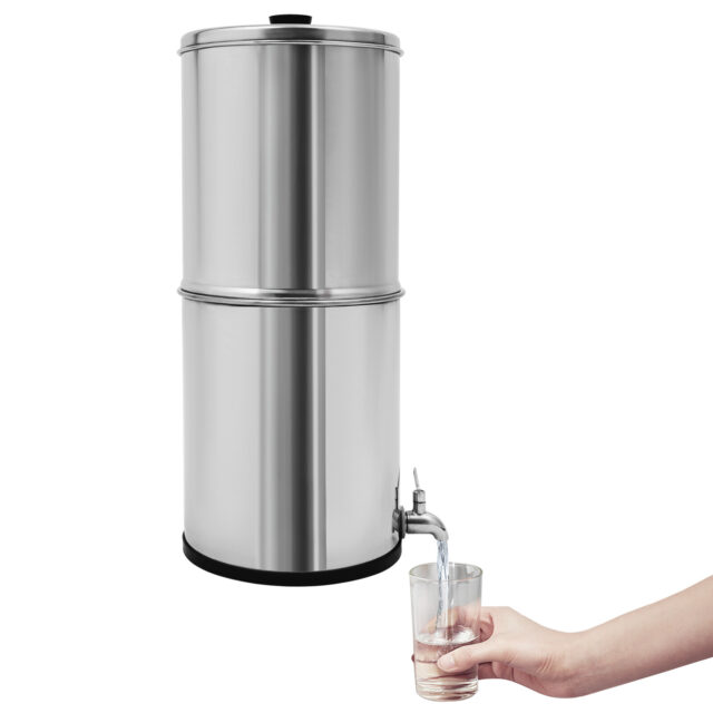Stainless steel gravity-fed water filter system with glass being filled